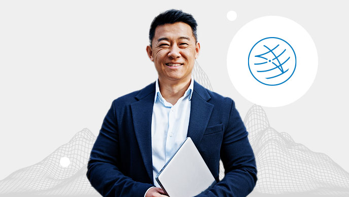 A smiling person wearing business casual clothes and holding a laptop overlaid on a wireframe of a mountain range