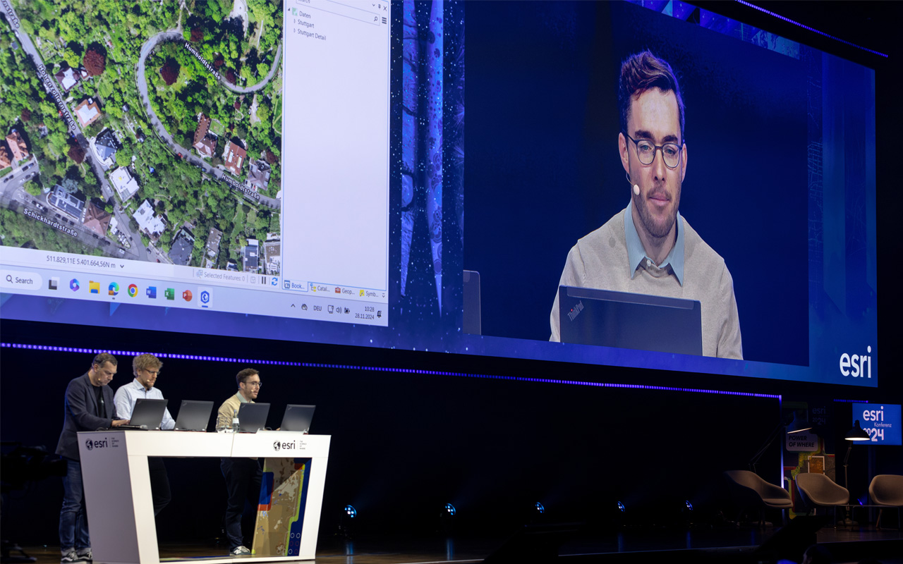 An island nation with rich green mountains and a busy dock