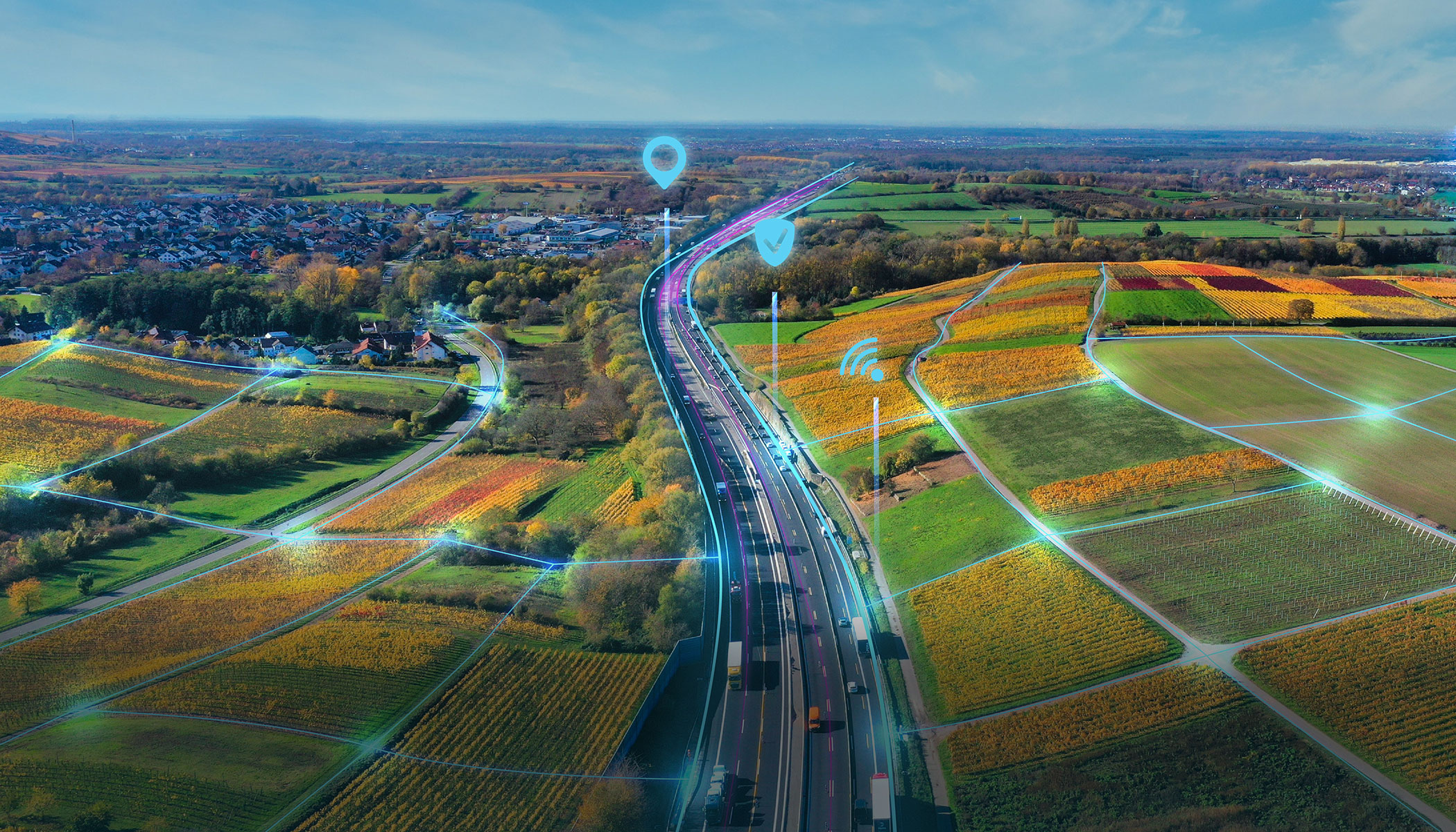 Luftbild einer Autobahn durch landwirtschaftliches und bebautes Gebiet (Bildquelle: ViA6West GmbH & Co. KG)