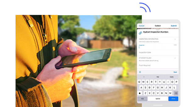 A person holding a mobile phone inputting the location of a fire hydrant that is pouring out water in the background