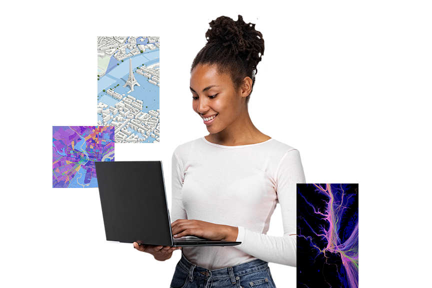 Eine junge Frau in einem weißen Oberteil tippt im Stehen auf einem schwarzen Laptop